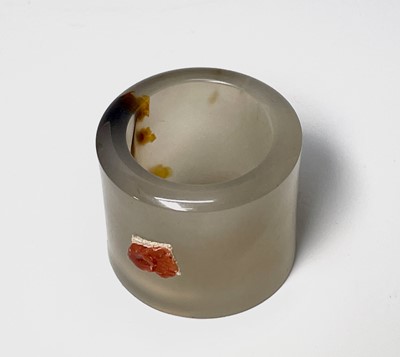 Lot 410 - A Chinese jade archers ring, diameter 3cm.