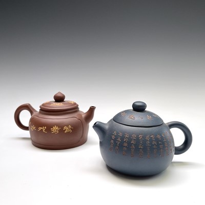 Lot 412 - Two Chinese Yixing teapots, the blue ground...