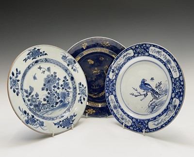 Lot 443 - Three large Chinese porcelain plates, 18th...