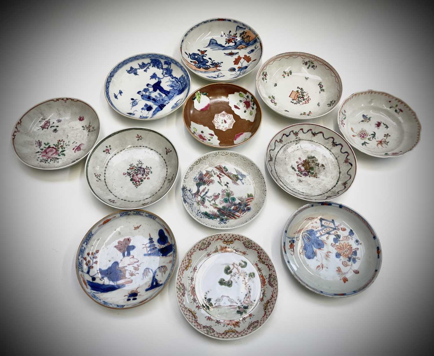 Lot 444 - A selection of twelve Chinese porcelain saucer...