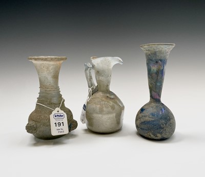 Lot 15 - Three iridescent glass vessels, possibly Roman,...