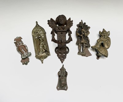 Lot 404 - Six novelty door knockers comprising cherub,...