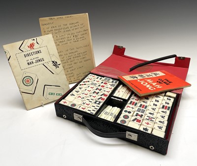 Lot 280 - A Dragon mah jong set, with bamboo backed...