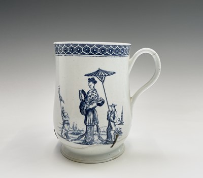 Lot 876 - An 18th century blue and white bell form mug,...