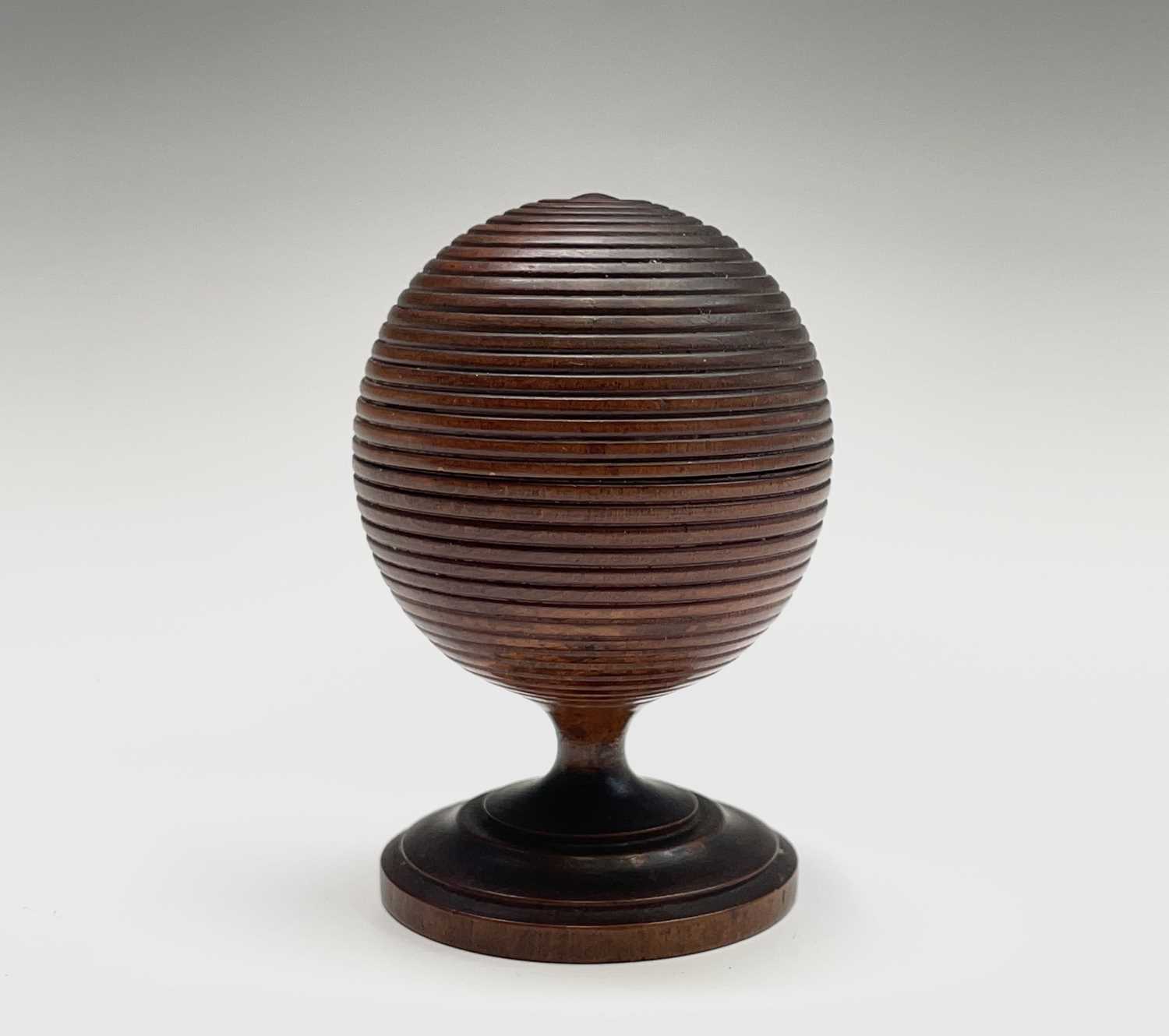 Lot 291 - A Victorian turned treen beehive pot and cover,...