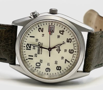 Lot 205 - A Seiko kinetic wristwatch, a ladies Tissot...