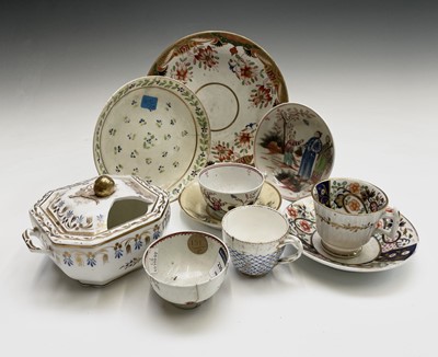 Lot 884 - A Newhall porcelain tea bowl and saucer,...