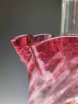 Lot 300 - A Victorian cranberry glass and brass oil lamp,...