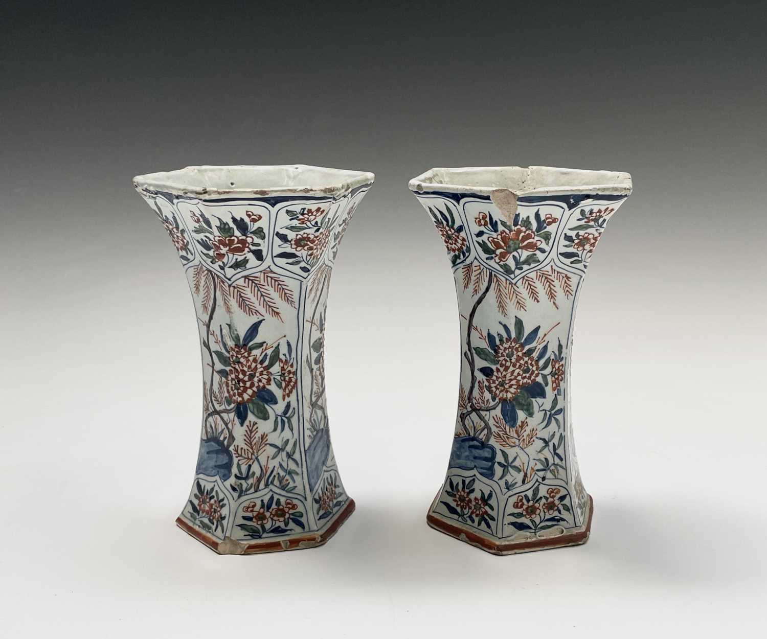 Lot 904 - A pair of Dutch Delft polychrome vases, 18th...
