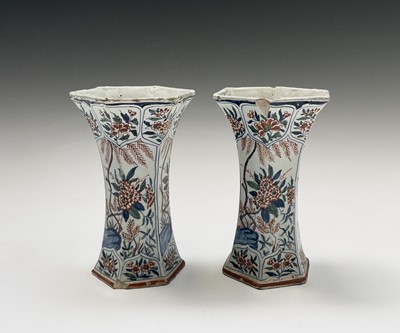 Lot 904 - A pair of Dutch Delft polychrome vases, 18th...