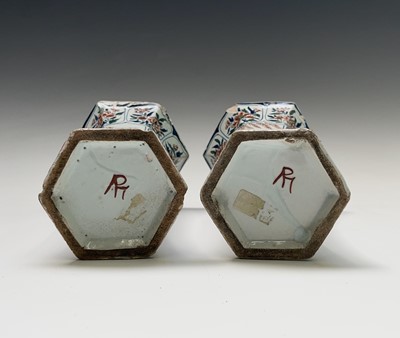 Lot 904 - A pair of Dutch Delft polychrome vases, 18th...