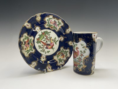 Lot 915 - A Continental porcelain mug, in the Worcester...