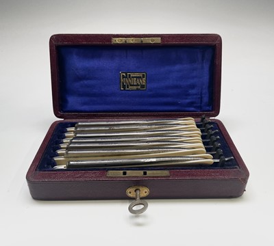 Lot 311 - A cased set of seven cut throat razors, each...