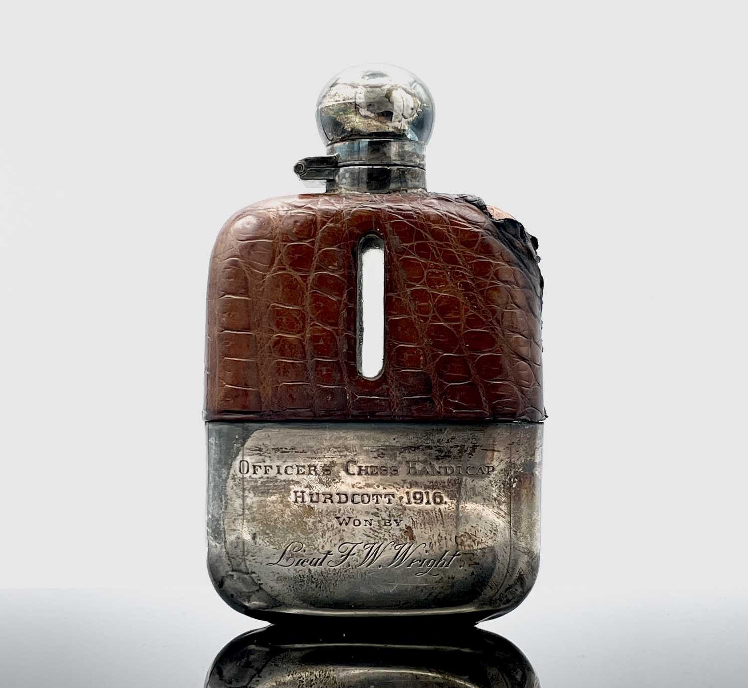 Lot 322 - A silver-mounted spirit flask