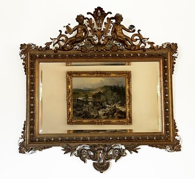 Lot 3107 - A French ornate gilt-gesso wall mirror, late...