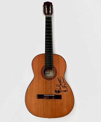 Lot 452 - Paul Young, a signed Eros six string guitar,...