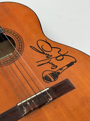 Lot 452 - Paul Young, a signed Eros six string guitar,...