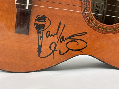 Lot 452 - Paul Young, a signed Eros six string guitar,...