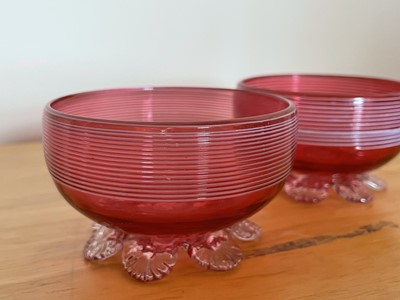 Lot 926 - A Victorian cranberry glass bowl with applied...