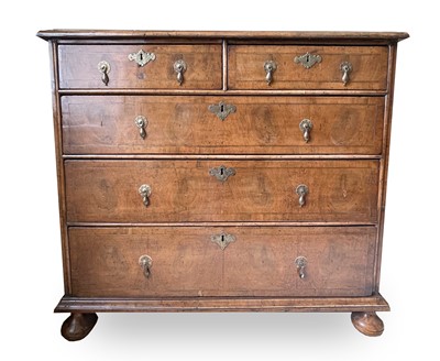 Lot 3134 - A George II walnut chest of two short and...