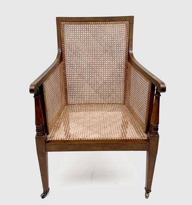 Lot 3207 - An Edwardian mahogany caned library armchair,...