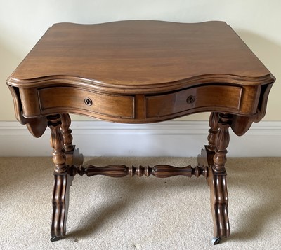 Lot 3135 - A French walnut serpentine shaped sofa table,...