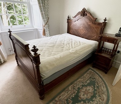 Lot 3138 - A 19th century French rosewood bed, the...