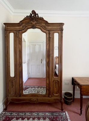 Lot 3145 - A French walnut wardrobe, late 19th century,...