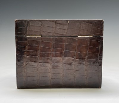 Lot 417 - An Asprey crocodile hide covered stationery...