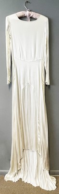 Lot 2811 - A 1920s ivory silk satin wedding dress,...