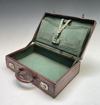 Lot 419 - An early 20th century crocodile skin briefcase...