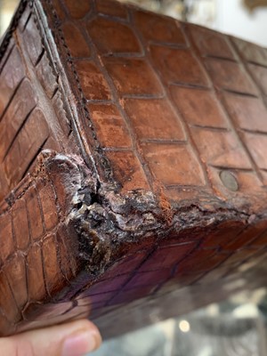 Lot 419 - An early 20th century crocodile skin briefcase...