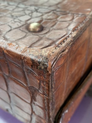 Lot 419 - An early 20th century crocodile skin briefcase...
