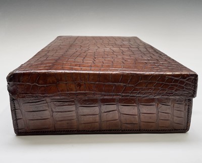 Lot 419 - An early 20th century crocodile skin briefcase...