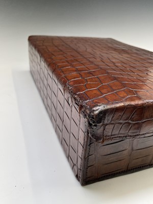 Lot 419 - An early 20th century crocodile skin briefcase...