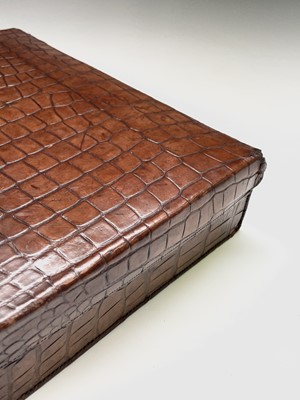 Lot 419 - An early 20th century crocodile skin briefcase...