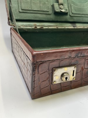 Lot 419 - An early 20th century crocodile skin briefcase...