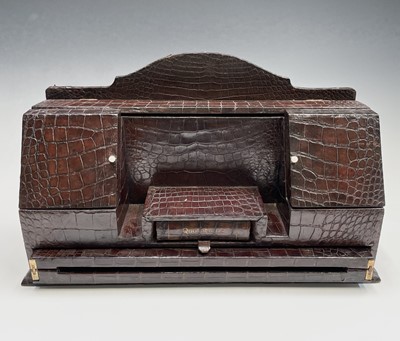 Lot 418 - An Asprey & Co crocodile desk stand and...