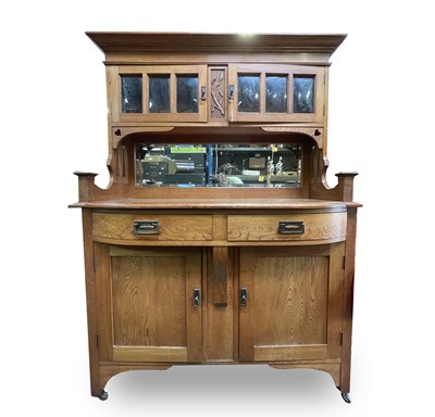 Lot 3206 - An Arts & Crafts oak sideboard, the upper part...