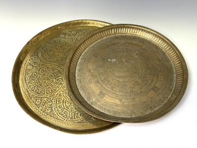 Lot 449 - An Indian circular brass tray, engraved with...