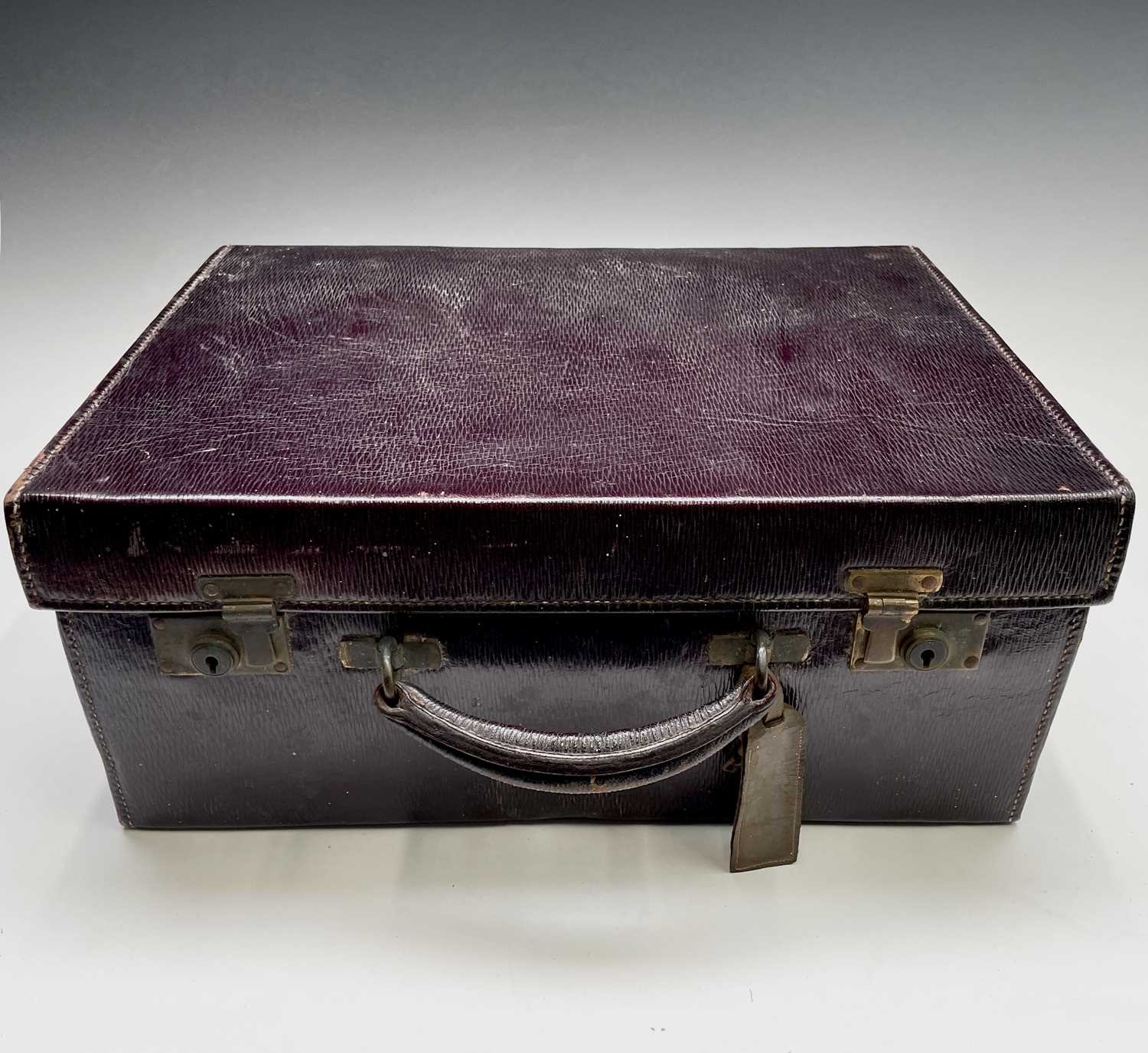 Lot 32 - A purple leather toilet case by Mappin and...