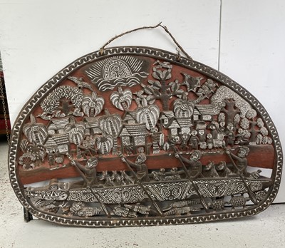 Lot 431 - An ethnic carved large plaque, decorated with...