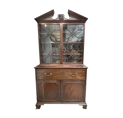 Lot 3188 - A George III mahogany secretaire bookcase, in...