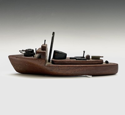 Lot 437 - A hand-built toy model gunboat, the timber...