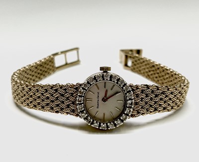 Lot 5 - A ladies Bueche-Girod 9ct gold wristwatch with...