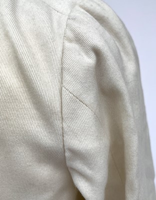 Lot 2852 - A ladies Edwardian cream wool suit, cream silk...