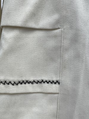 Lot 2852 - A ladies Edwardian cream wool suit, cream silk...