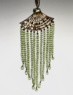 An Egyptian revival silver-gilt pendant with...