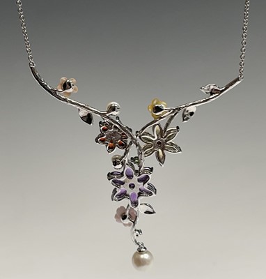 A naturalistic necklace with entwined...