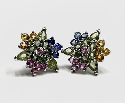 Lot 223 - A pair of multi-coloured sapphire earrings set...